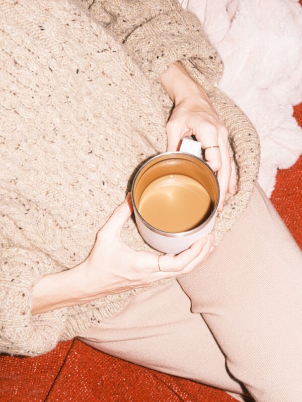 Otto Student Living by TAMU Campus: Student with Coffee