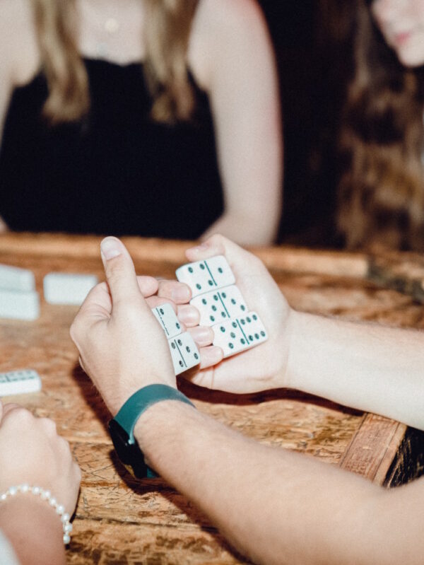 Otto Student Living by TAMU Campus: Students Playing Dominos